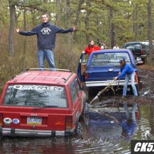 Me (in the red sweater) pulling another XJ out