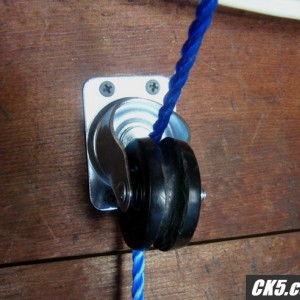Caster being used as a pulley