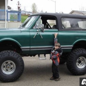 6'6" tall man, and the truck dwarfs him