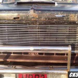 nice billet grill and rusted/bent/kicked hood w/ hood scoop