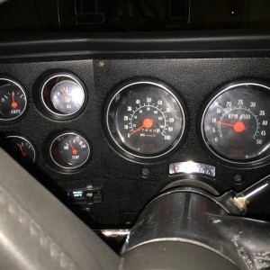 Freshly done interior of 75 Jimmy - Ebay Gauge Cluster with Tach