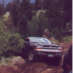 My Buddy Greg with his Shiny, New, Bone-Stock before this trip Undamaged 98 Dodge Dakota