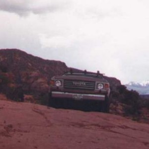 Greg's Land Cruiser powering up a hill
