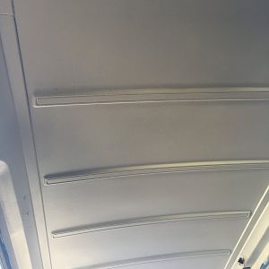 Painting the roof with white semi-gloss house paint