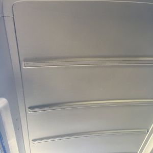 Painting the roof with white semi-gloss house paint
