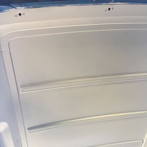Painting the roof with white semi-gloss house paint