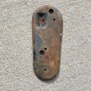 piece in bottom of orange door