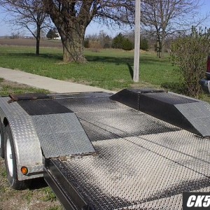 Trailer with dirive-overs