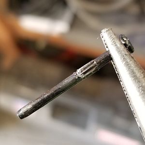 Pin that holds manual shift shaft