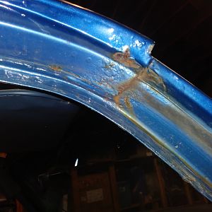 Upper cab pass side rust under paint