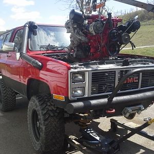 installing the 6.5, my crane is just too short so I pulled a tire off to lower truck