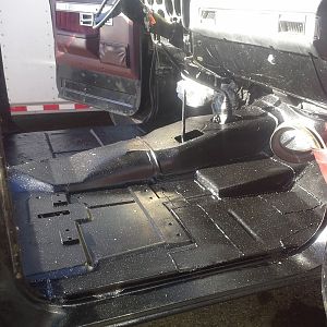 sprayed up front.  I thought I might reinstall the carpet so I did not grind the welds... But decided to just leave it sprayed out in Rino Guard