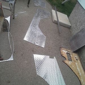 The aluminum cuts easily with a jig saw if you keep the blade wet with soapy water to prevent aluminum from sticking to the saw
