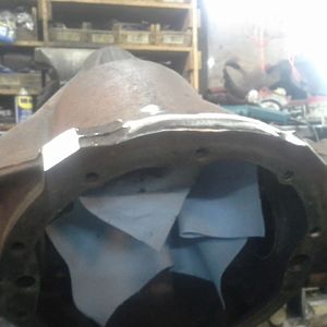 I started with a nice straight 10 bolt from my diff pile.  I started by shaving the bottom "ears"