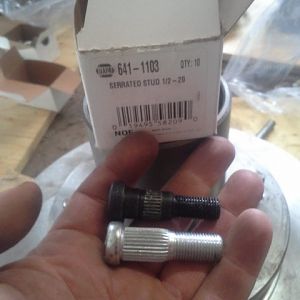 I replaced the front stock style 7/16 studs with 1/2"studs (70 chevy 3/4 ton 2wd fronts)