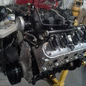 6.0L upgrade is next with a custom exhaust etc.  The low mileage stock 350 will get tucked away with the rest of the parts we removed