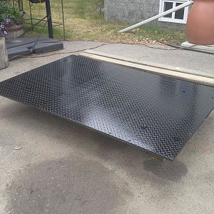 Our new floor for the step side.  Steel 3/16 checker plate or diamond plate I guess