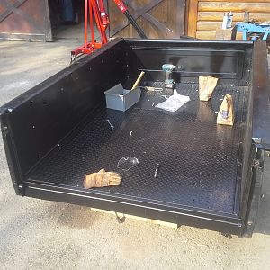 We ended up making the floor out of 2 pieces laid sideways to get the width we needed and welding them together.  we matched patterns