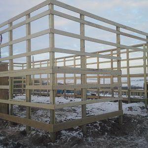The original concrete foundation had mostly been powderized by the fire, we built a pole barn, and saved what foundation we could for retaining walls