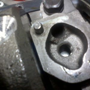 Oil pump passage mismatch on main cap