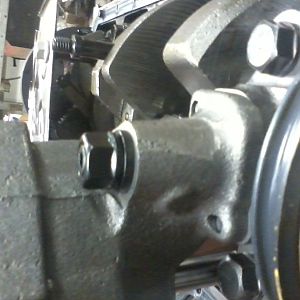 Oil pump stud and pump installed