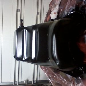 Oil pan with fitting brazed in for oil temp testing later