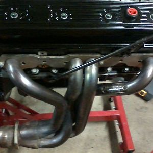 Hedman stainless headers shown with truck dipstick installed