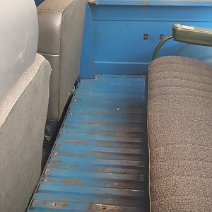 front of rear seat