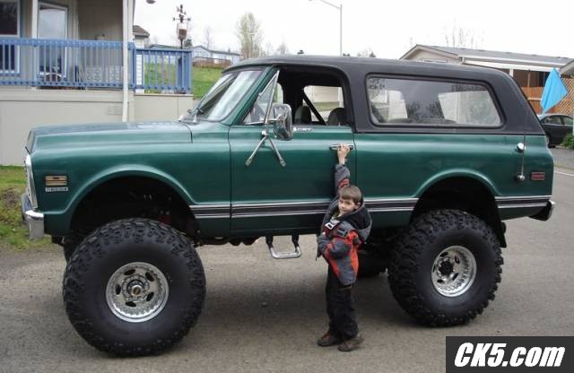 6'6" tall man, and the truck dwarfs him