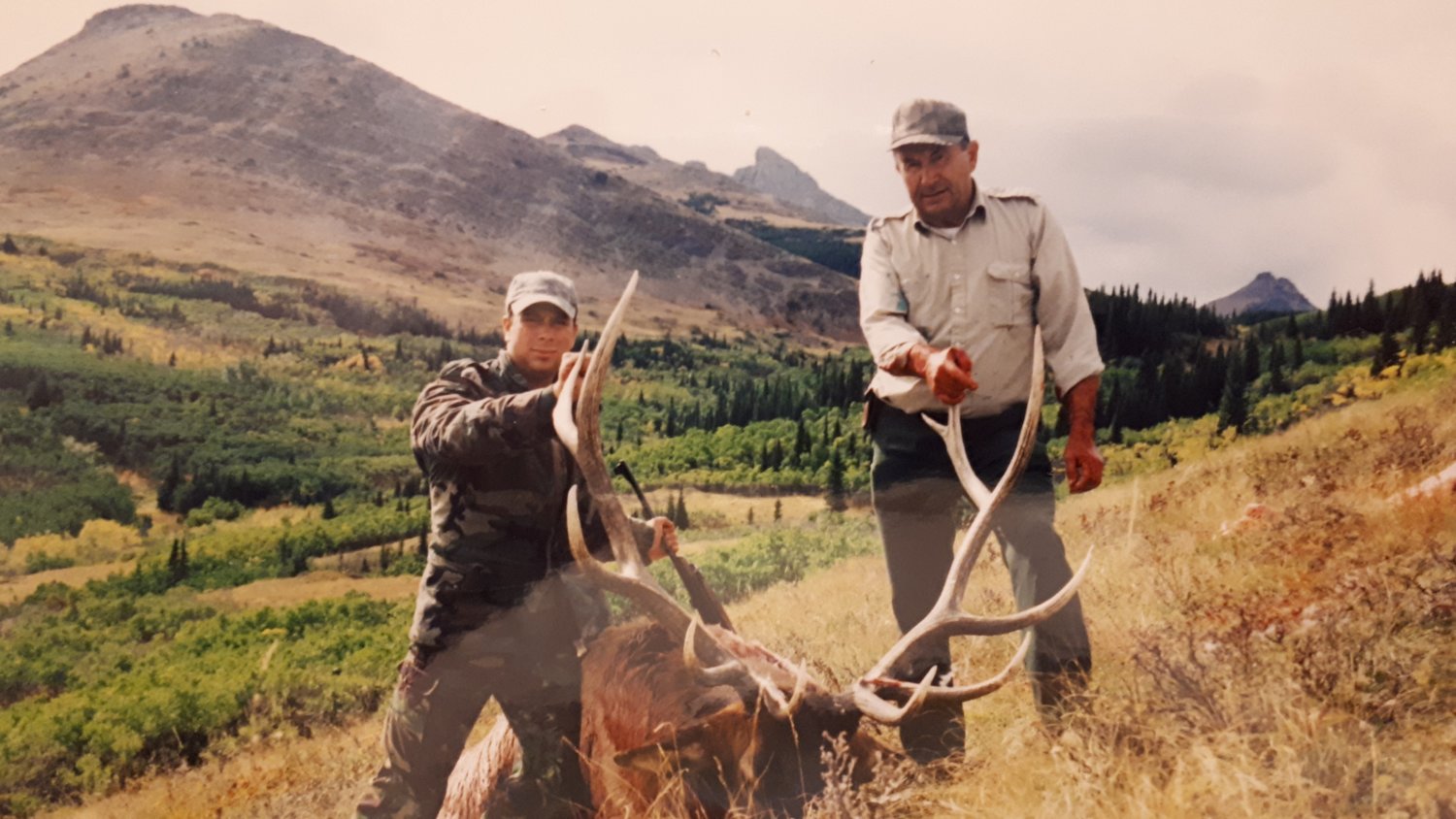 A nice Bull elk I got with my Dad (different year than last pic),  4 generations of my family have hunted these canyons for elk.