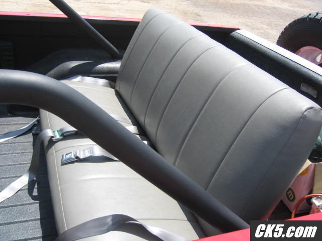 back seat complete with seat belts