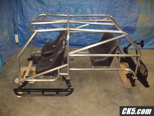 Cage, sliders, and rear bumper / tire carrier