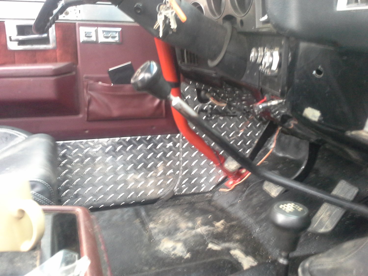 drivers side kicks.  I also cut a drain notch in the rocker to floor rail on both sides so water can just drain out, just cut the weather strip back