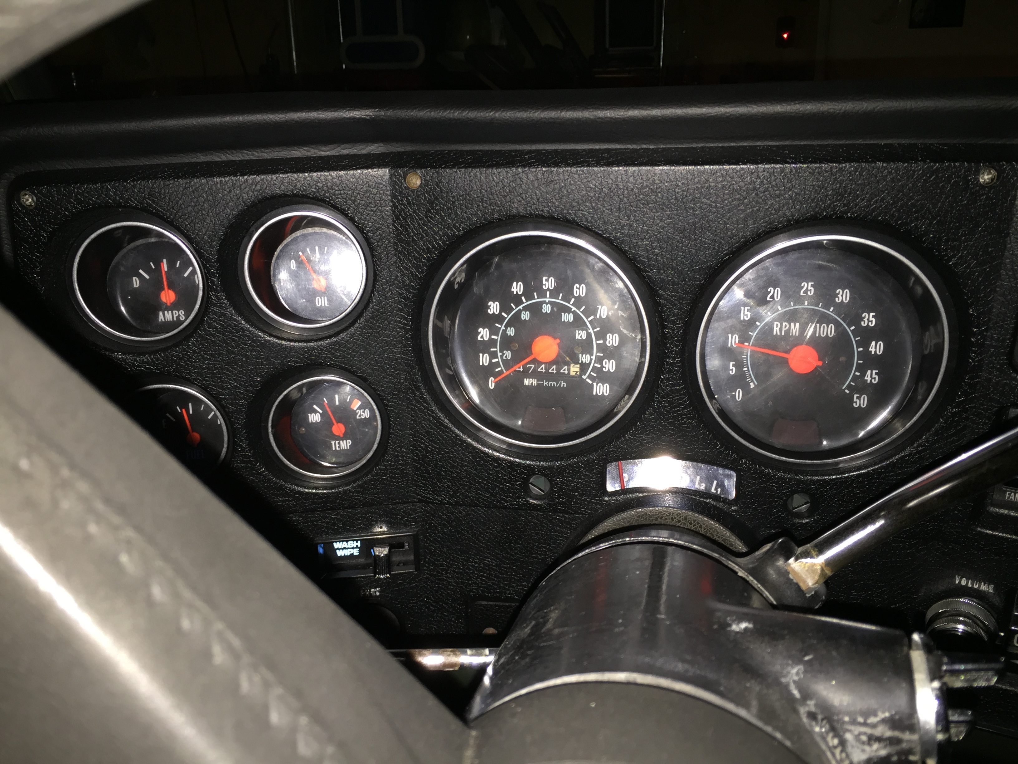 Freshly done interior of 75 Jimmy - Ebay Gauge Cluster with Tach