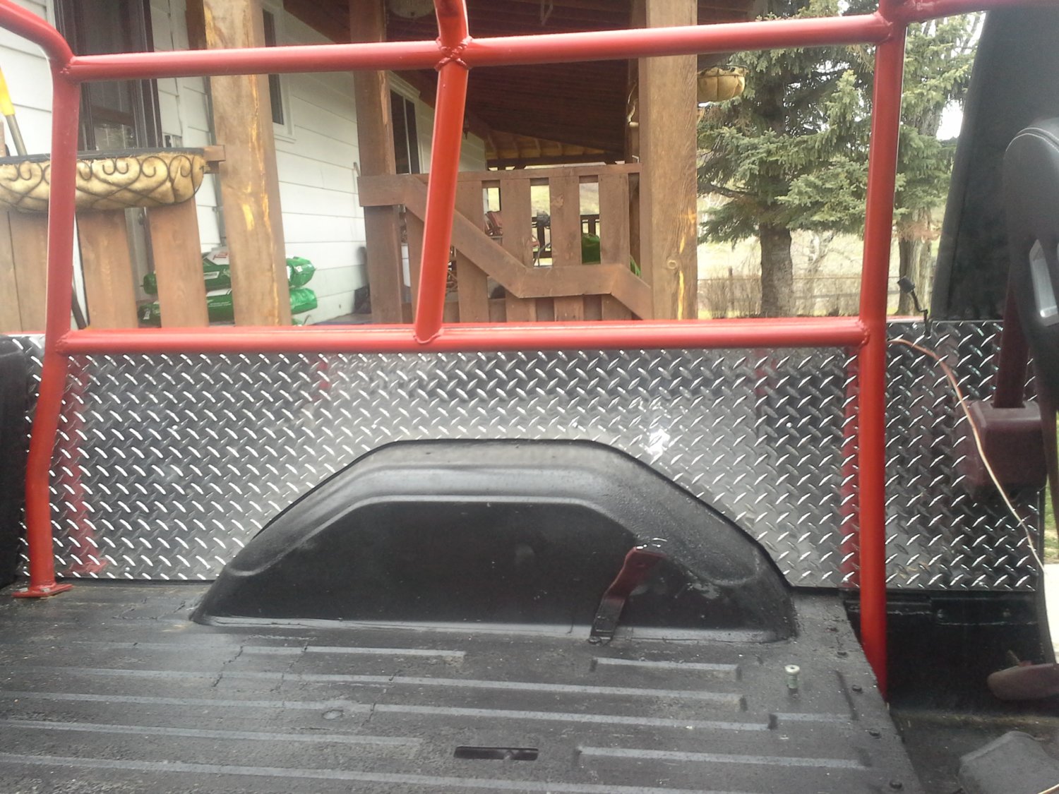 i didn't grind the floor welds,  but i did drill some drain holes and rino lined