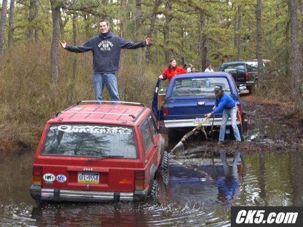 Me (in the red sweater) pulling another XJ out