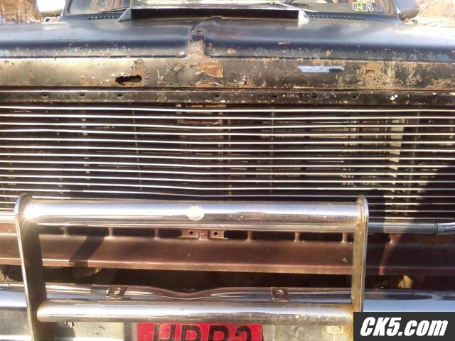 nice billet grill and rusted/bent/kicked hood w/ hood scoop