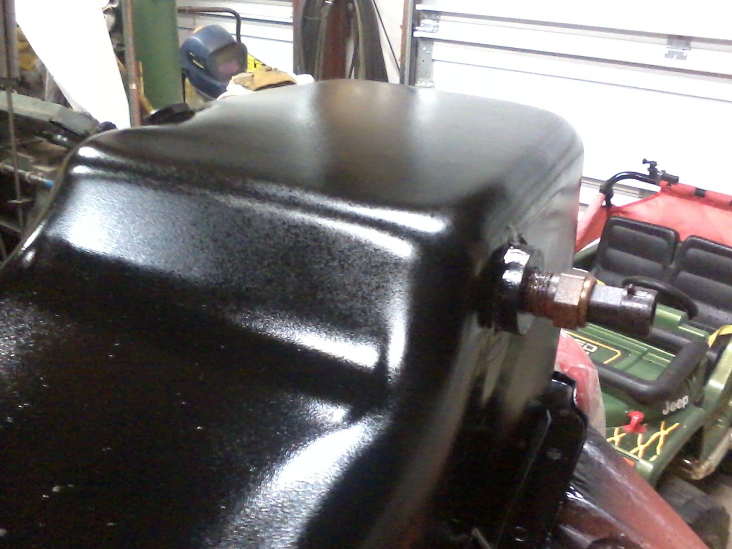 Oil pan with fitting brazed in for oil temp testing later