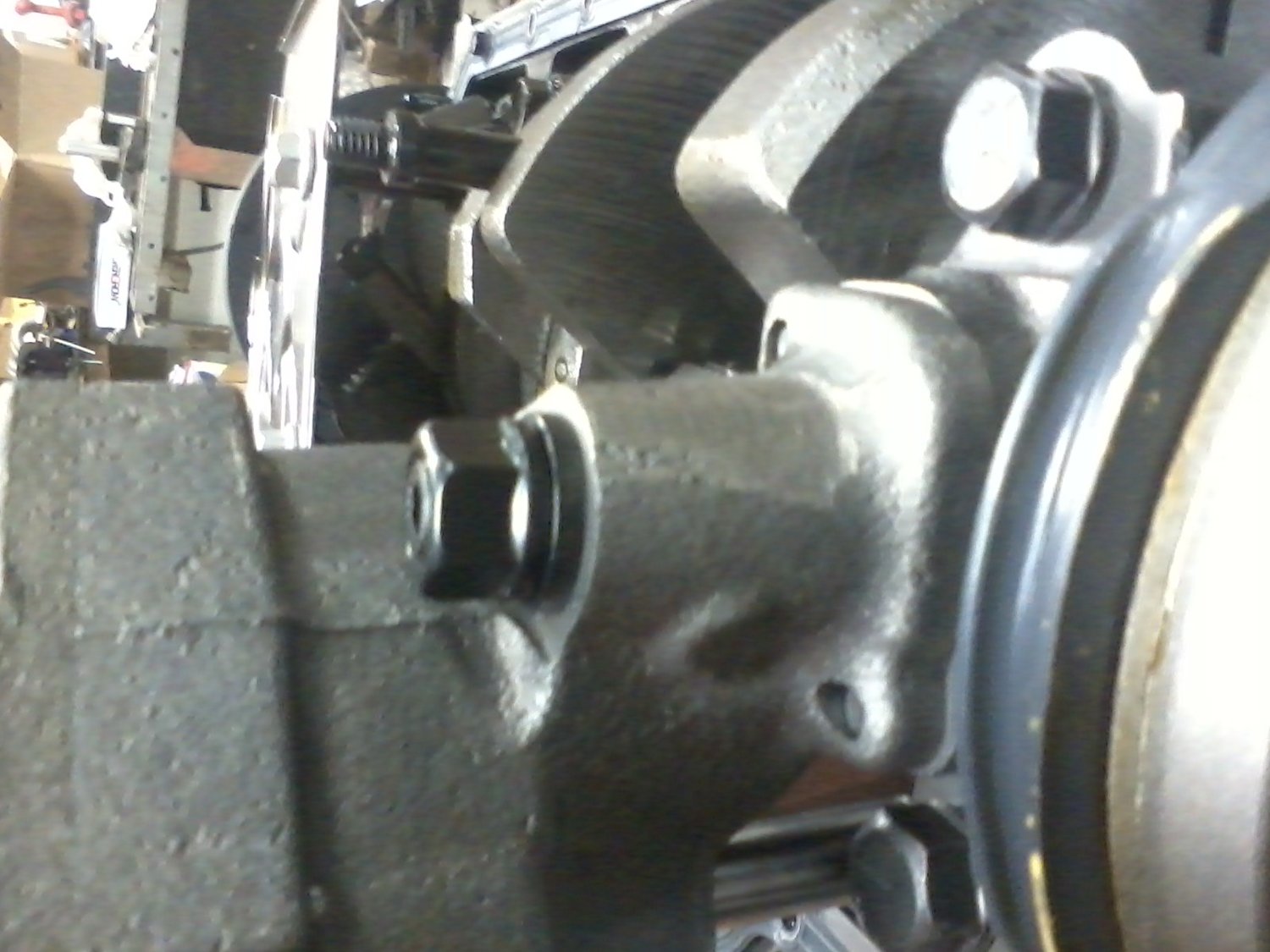 Oil pump stud and pump installed