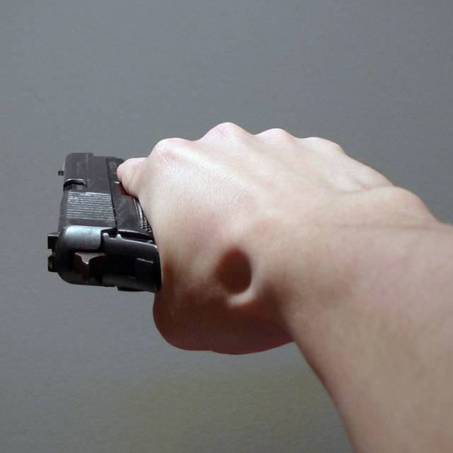 Pistol_held_sideways