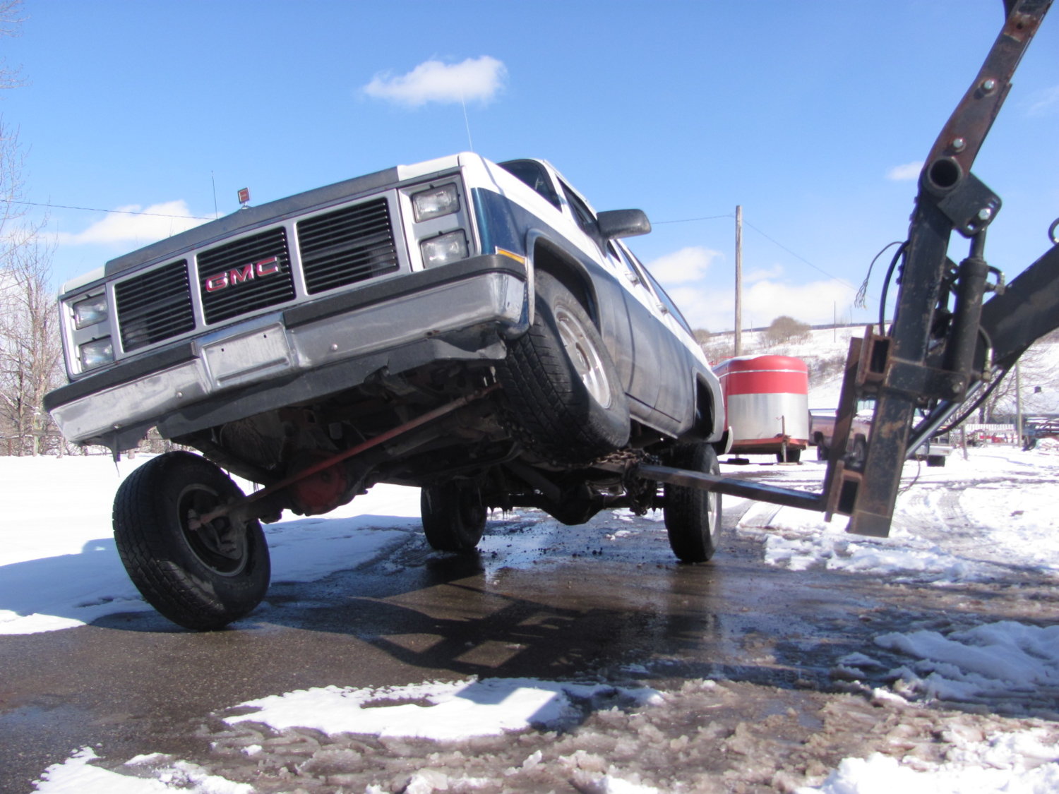 .pretty flexy for a trailer towing truck....but front drive shaft and shocks are limiting it...i can fix that