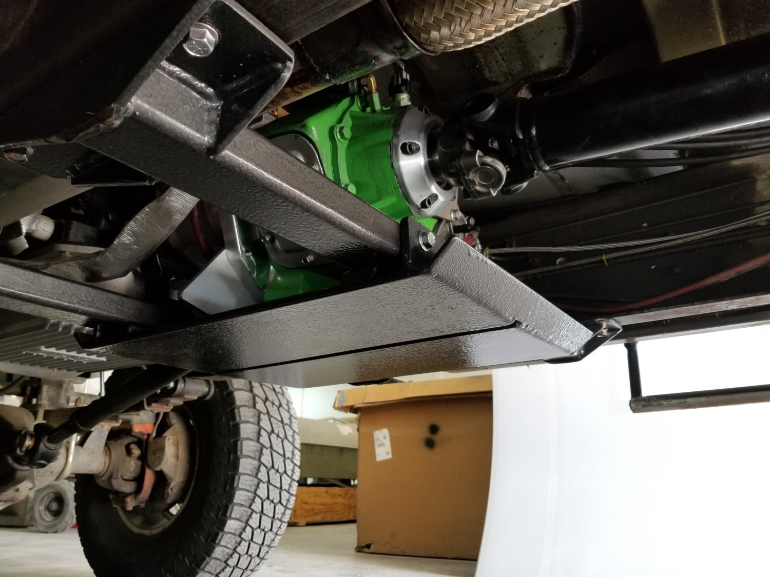 Skid plate & billet output retainer