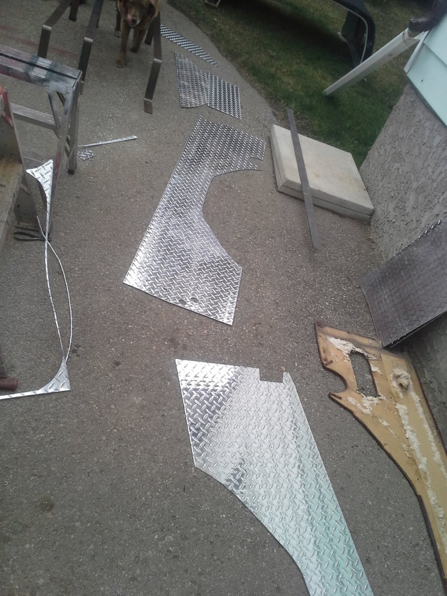 The aluminum cuts easily with a jig saw if you keep the blade wet with soapy water to prevent aluminum from sticking to the saw