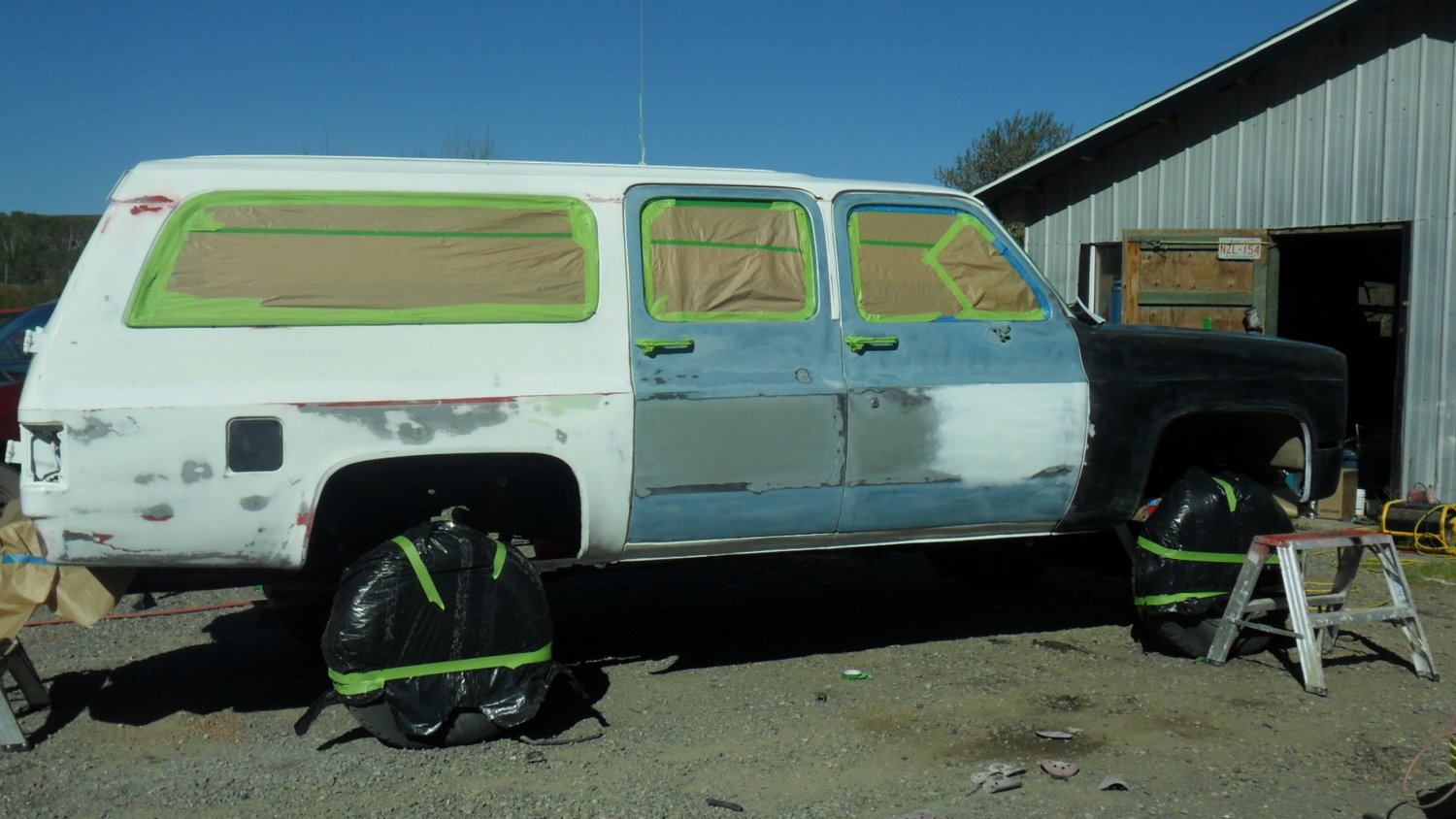 Time to do the body work...I was learning as I went along that both bodies I used panels from had seen some hail