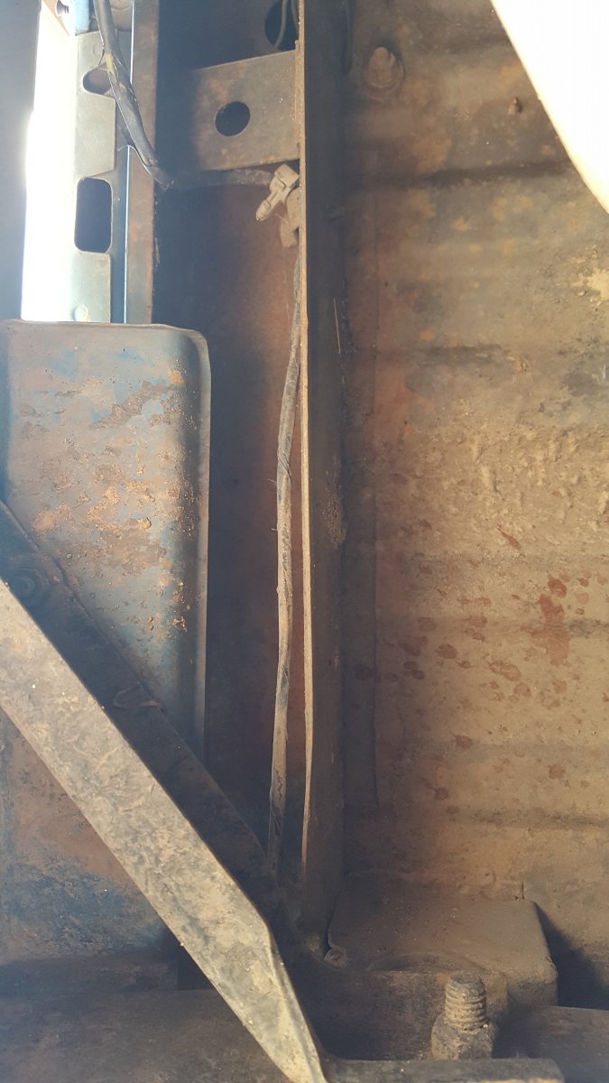 underneath rear cargo floor 1