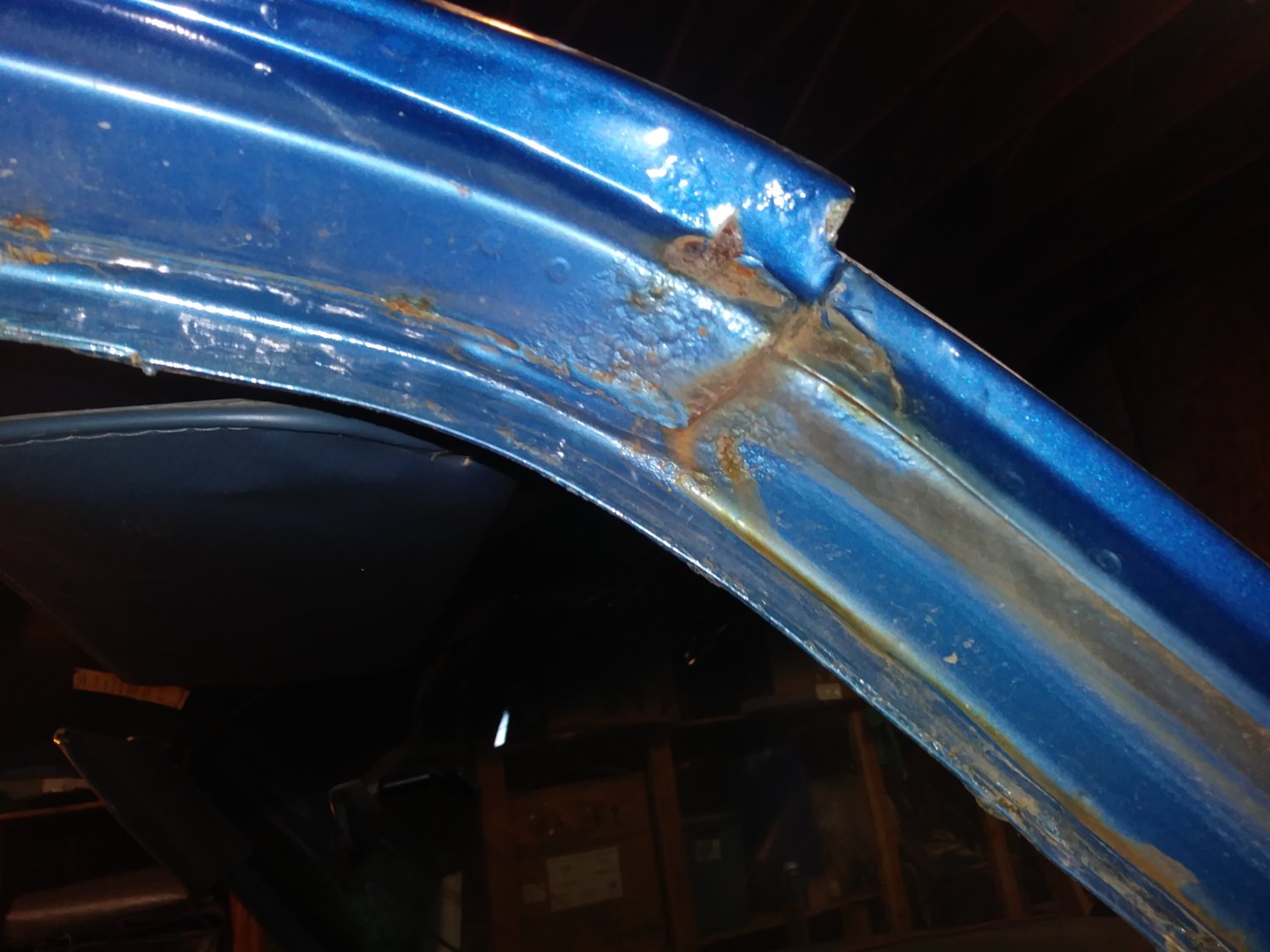 Upper cab pass side rust under paint