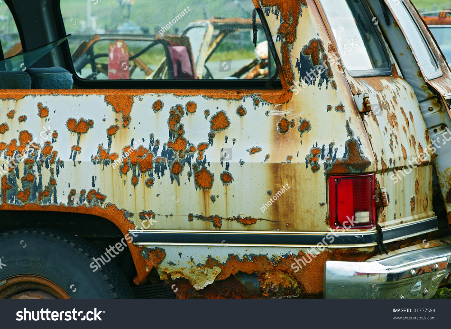 stock-photo-rusted-out-junker-car-41777584.jpg