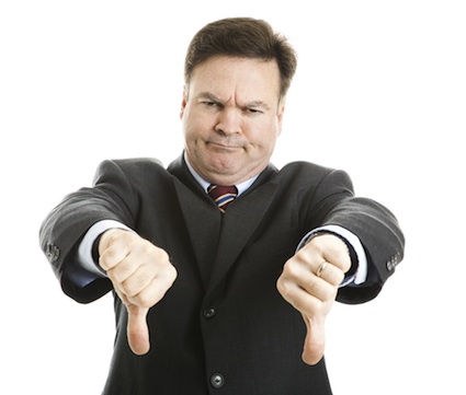 Businessman-frowning-with-thumbs-down.jpg